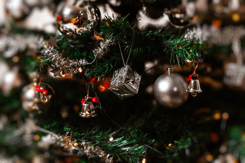 Celebrate the Joys of Christmas: Fun Ideas for Decorating a Synthetic Christmas Tree with Lights and Ornaments